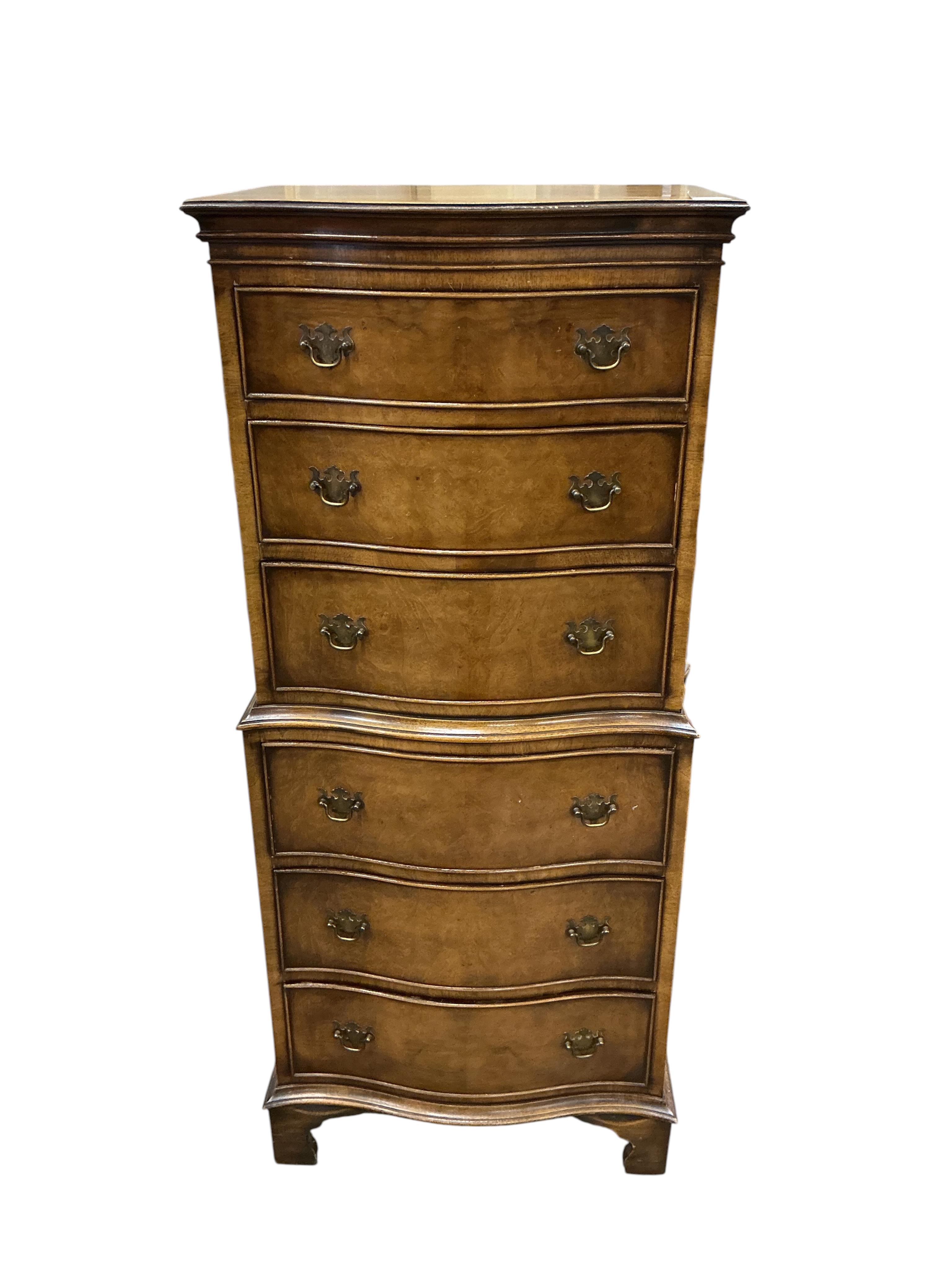 A reproduction George I style narrow walnut serpentine six drawer chest, width 55cm, depth 39cm, height 130cm
